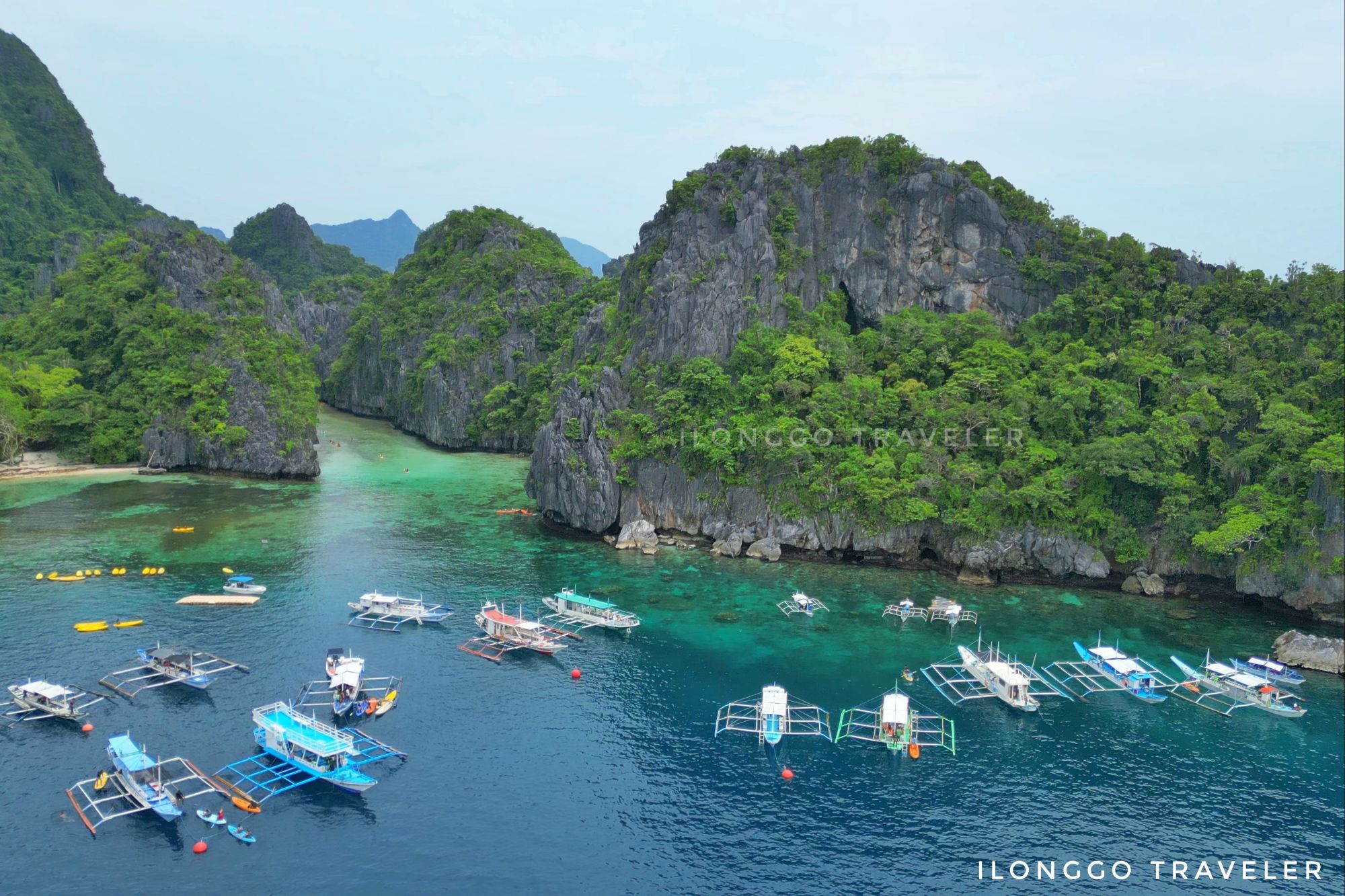 Aerial view of Palawan limestone cliffs and blue lagoons
