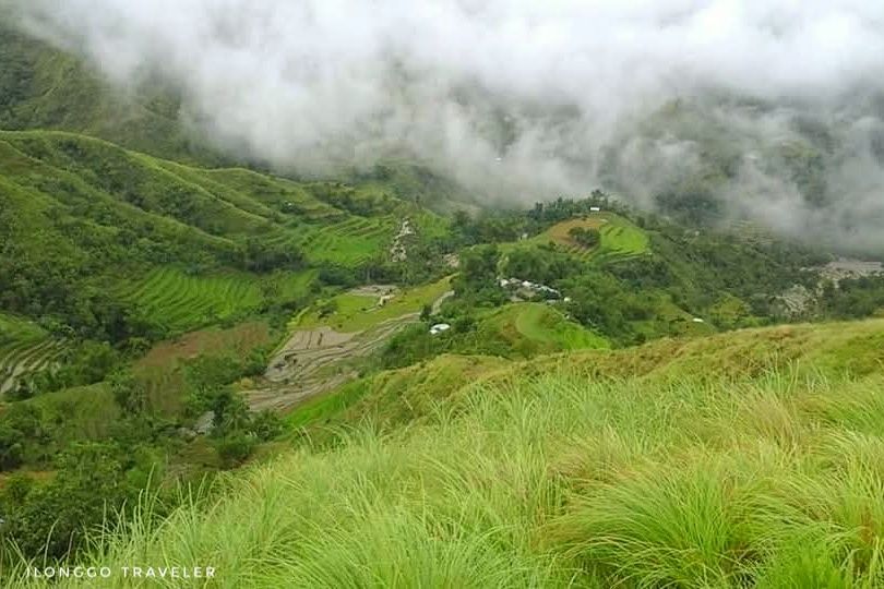 A fog-covered Barangay Capnayan seen from the heights of Mt. Igmatongtong in Antique, Philippines
