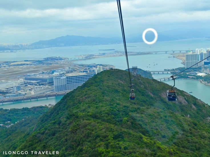 Ngong Ping 360 cable car ride with scenic view of mountains and Lantau Island, Hong Kong