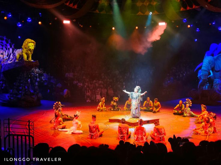 Festival of The Lion King live performance with Simba puppet on rotating stage at Hong Kong Disneyland
