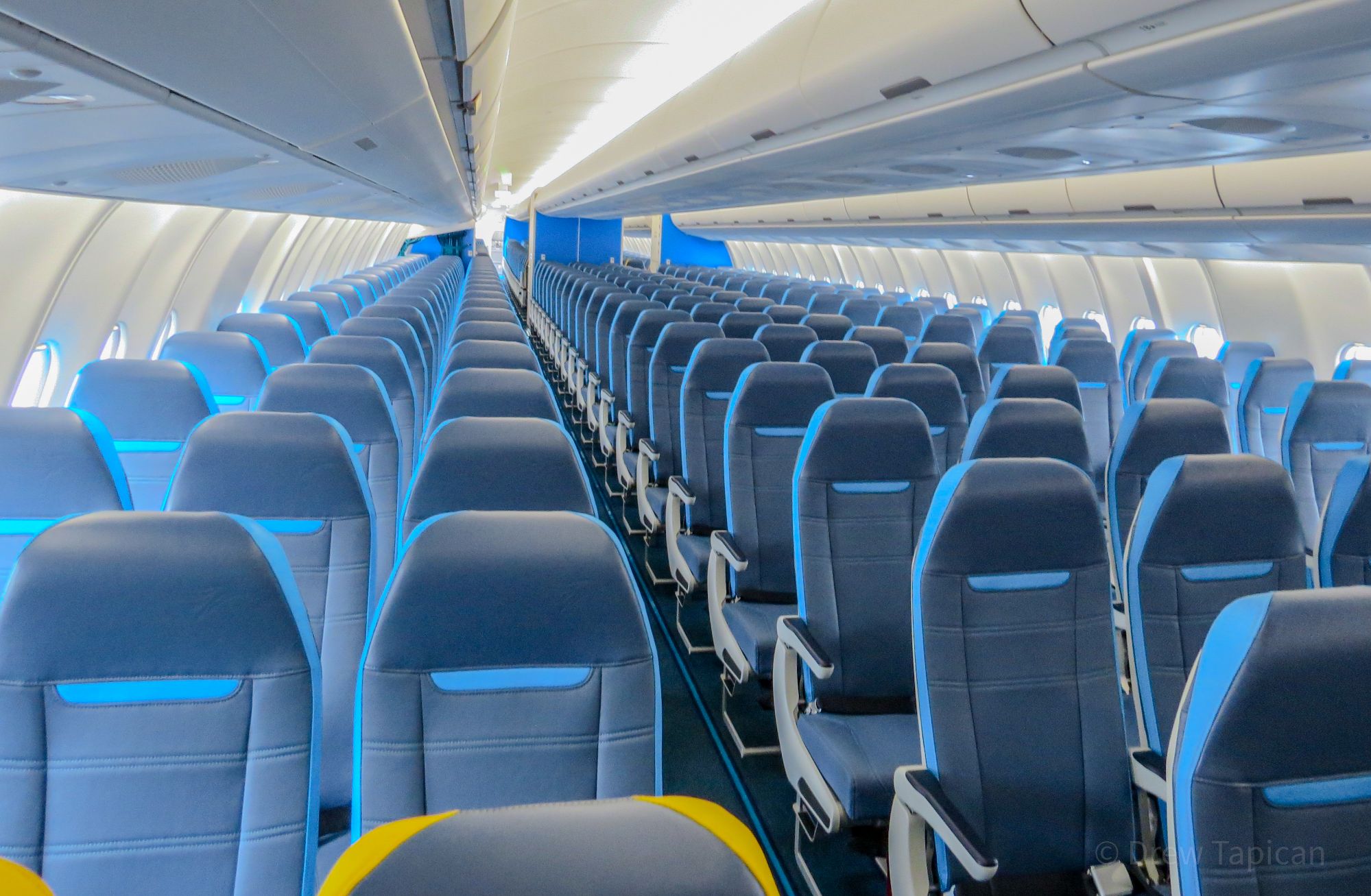 Cebu Pacific A330 Economy Cabin Center-Aisle View Cabin interior of Cebu Pacific A330 showing center aisle and economy class seating