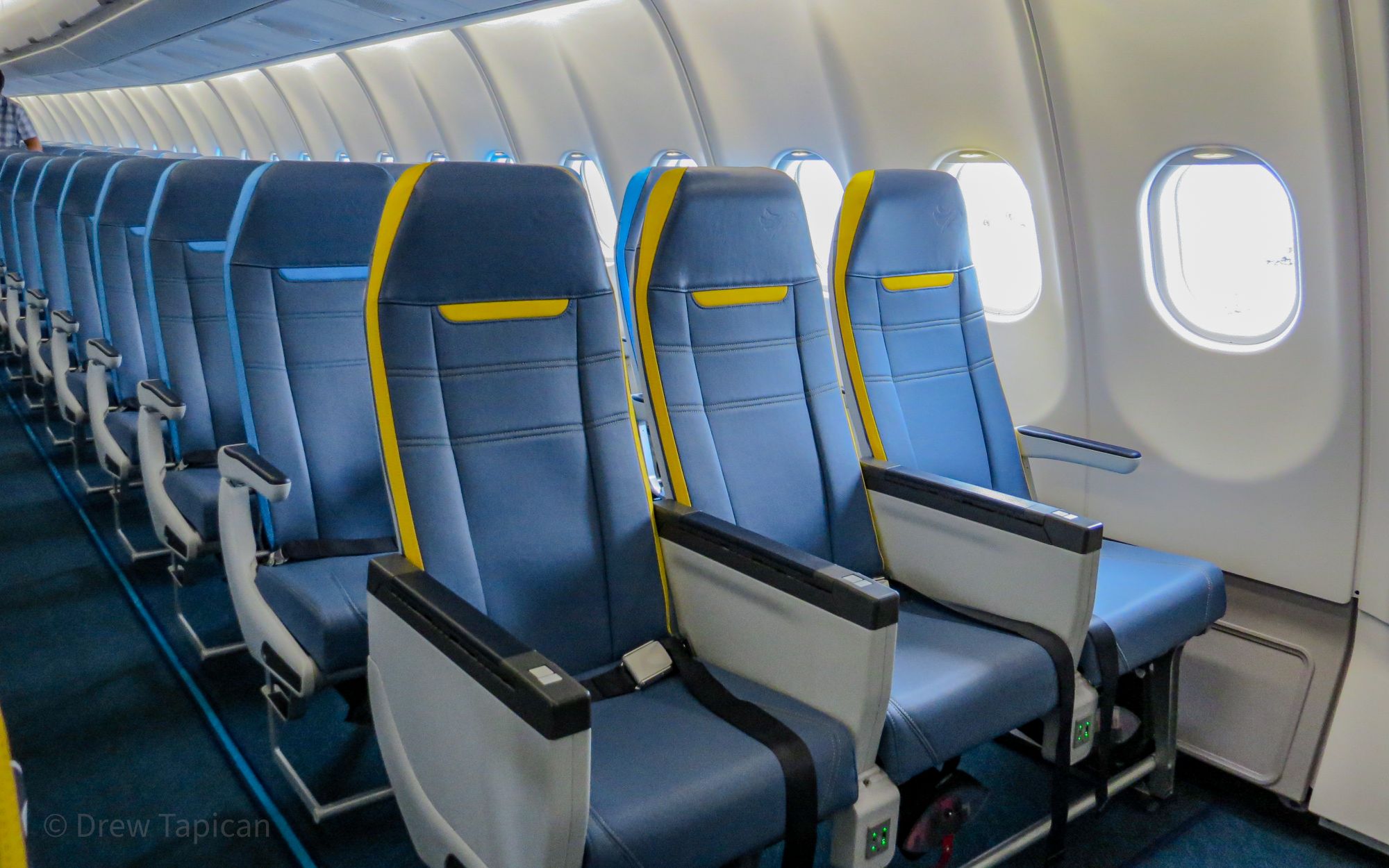 Cebu Pacific A330 Cabin Window-Seat Perspective Window-seat view inside Cebu Pacific A330 cabin with ambient lighting