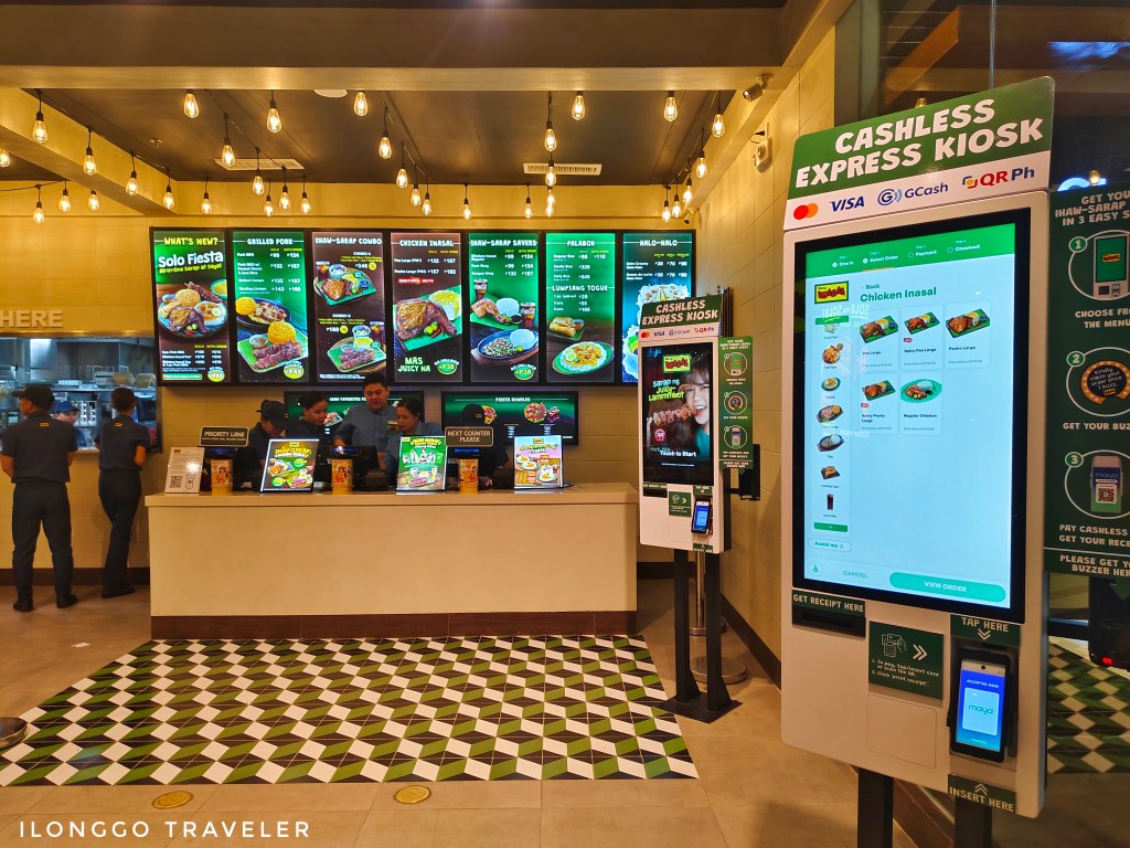 Ordering counter at Mang Inasal Robinsons Place Iloilo with LCD self-order kiosk and service counter