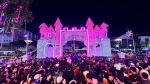 A large crowd gathers in front of the Iloilo Provincial Capitol at night as the building lights up with Christmas decorations during its official opening of lights on December 5, 2025.