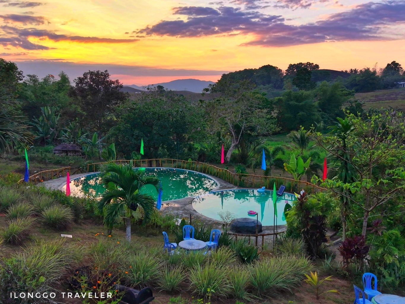 Sunset at Alawihaw Eco Farm, San Rafael Iloilo Golden sunset view at Alawihaw Eco Farm in San Rafael Iloilo with mountain landscape