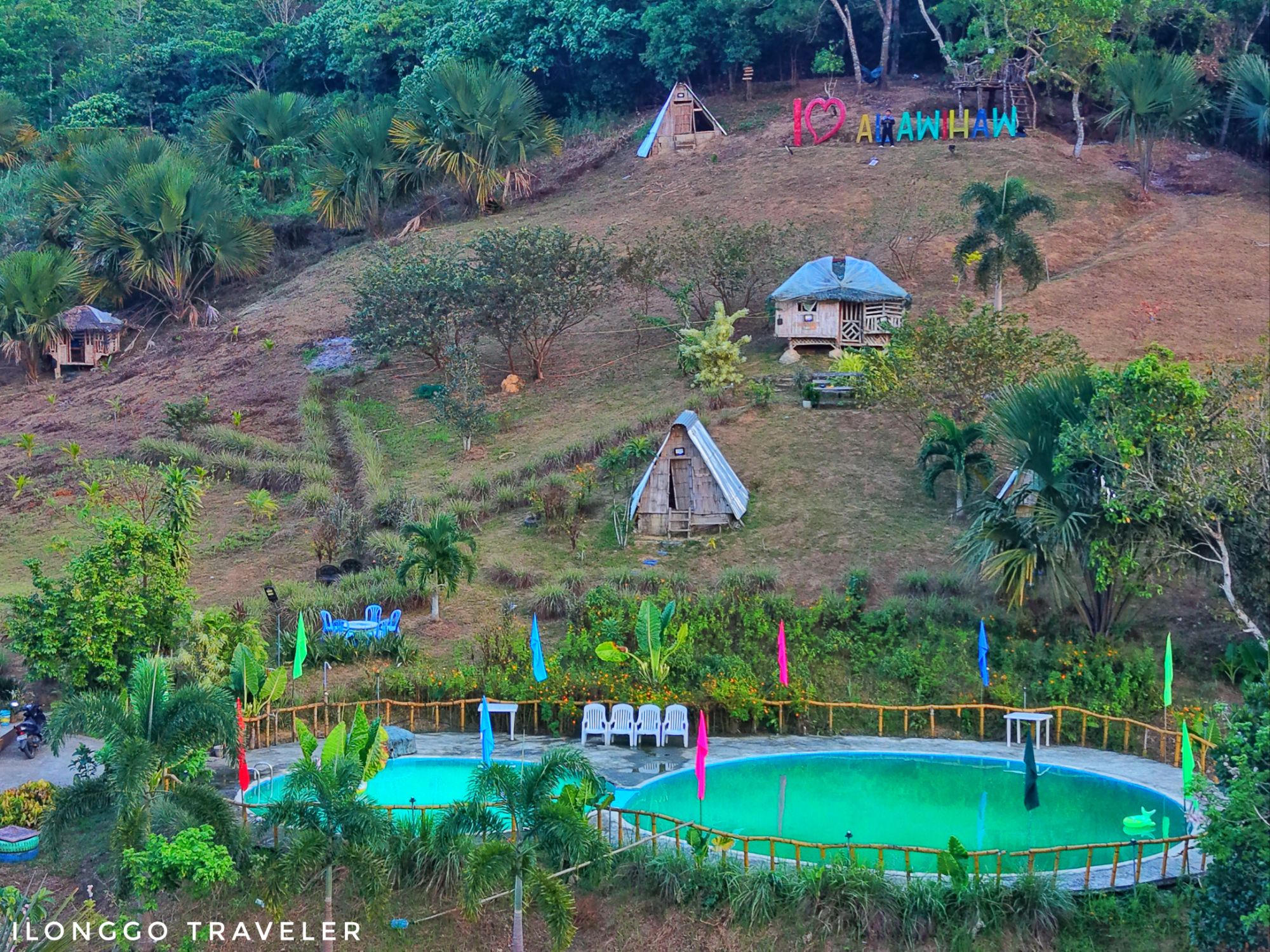 Hills view of Alawihaw Eco Farm Hillside view of Alawihaw Eco Farm showing pool and camping area in San Rafael Iloilo